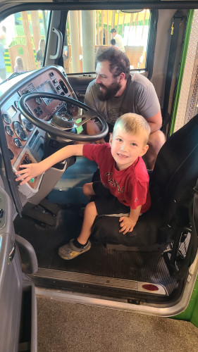 Thomas in the Walmart truck at the Amazeum