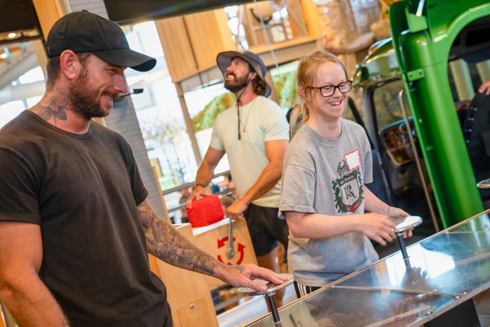 Guests from the Adventure For All group enjoy playing in the General Mills Lift, Load &amp;amp;amp;amp;amp;amp;amp;amp;amp;amp;amp;amp;amp;amp;amp;amp;amp;amp;amp;amp;amp;amp;amp;amp;amp;amp;amp;amp;amp;amp;amp;amp;amp;amp;amp;amp;amp;amp;amp;amp;amp;amp;amp;amp;amp;amp;amp;amp;amp;amp;amp;amp;amp;amp;amp;amp;amp;amp;amp;amp;amp;amp;amp;amp;amp;amp;amp;amp;amp;amp;amp;amp;amp;amp;amp;amp;amp;amp;amp;amp;amp;amp;amp;amp;amp;amp;amp;amp;amp;amp;amp;amp; Haul Exhibit at the Scott Family Amazeum.