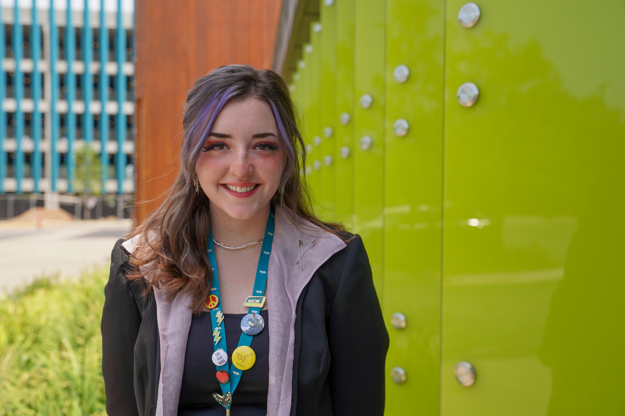 Savannah Bollinger standing outside of the Amazeum.