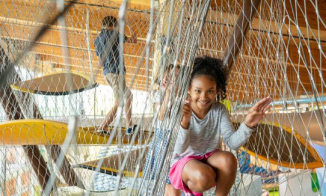 Girl Playing in Ropes of Canopy Climber FillWzc1MCw0NTBd